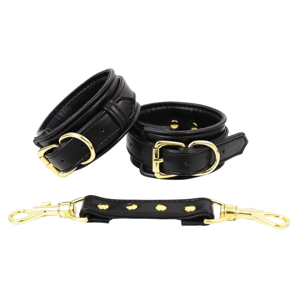 Черные наручники с золотистой фурнитурой