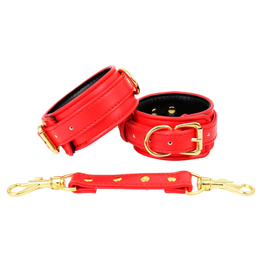 Красные наручники с золотистой фурнитурой